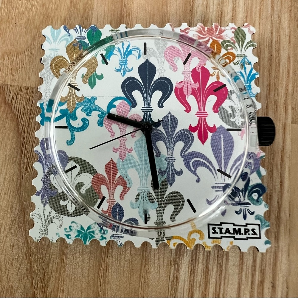 S.T.A.M.P.S. Interchangeable watch face with fleur de lis design